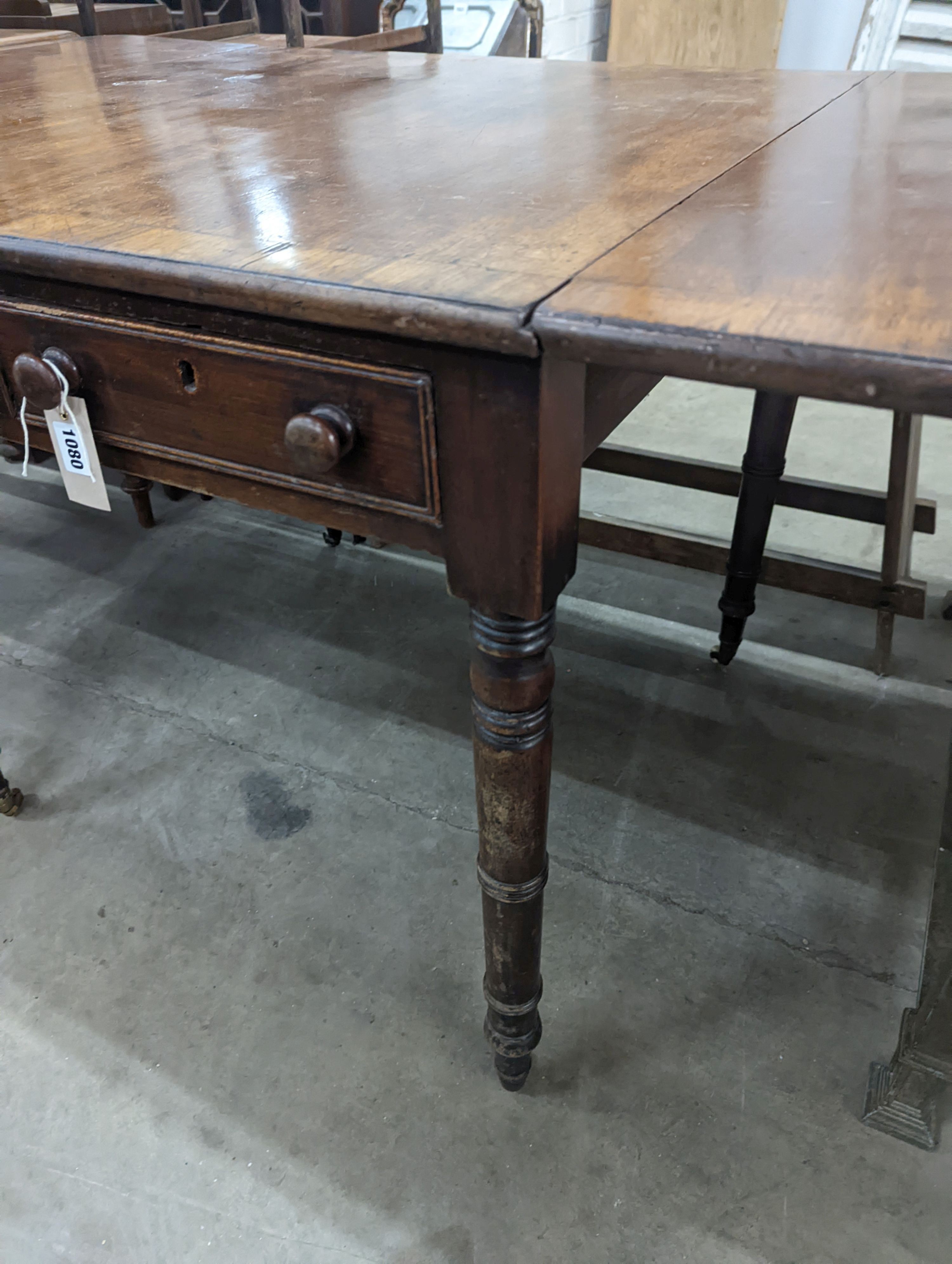 A Regency rosewood banded mahogany sofa table, 128cm extended, depth 75cm, height 73cm